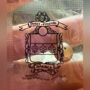 Perlas Amante Majorca pearls in the original cellophane packaging.